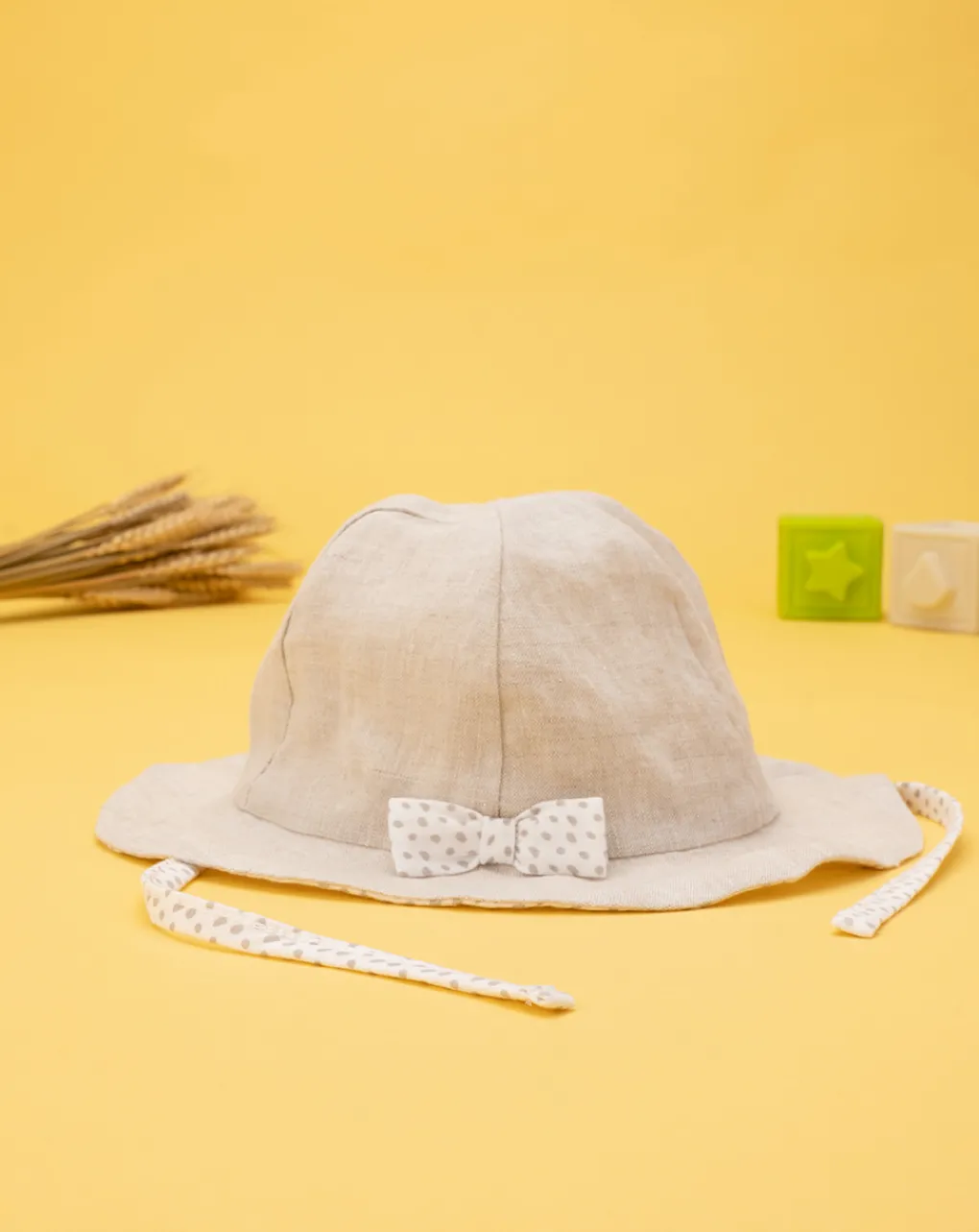 Prenatal Cappellini Cuffiette E Muffole-Cappello Neonata In Lino Con Fiocco
